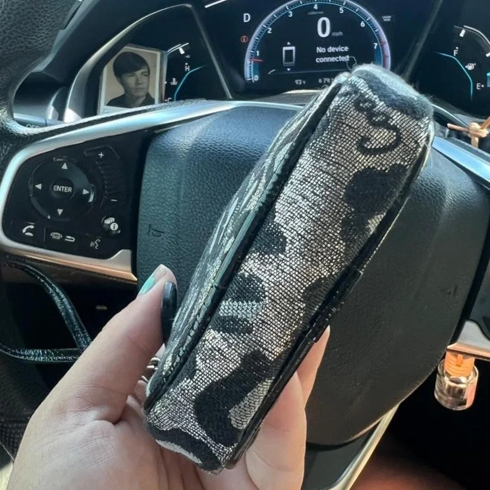 Coach black leopard print mini cosmetic pouch bag leopard print metallic black
